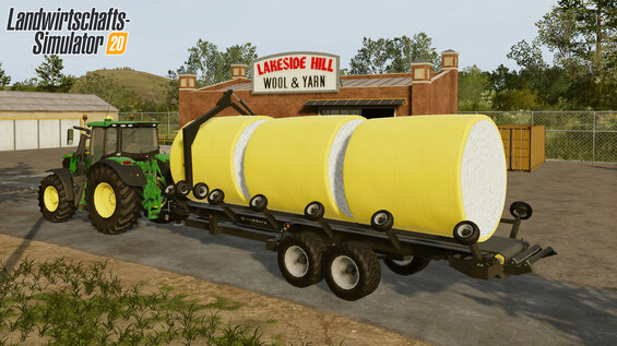 McCormick Industries Cotton Tag Trailer und John Deere CP690 transportieren Baumwollballen
